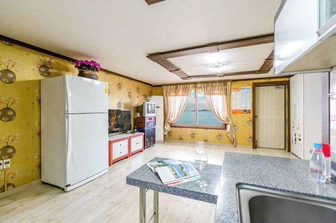 Imagen de la habitación del Hotel Sunrise Pension. Foto 4