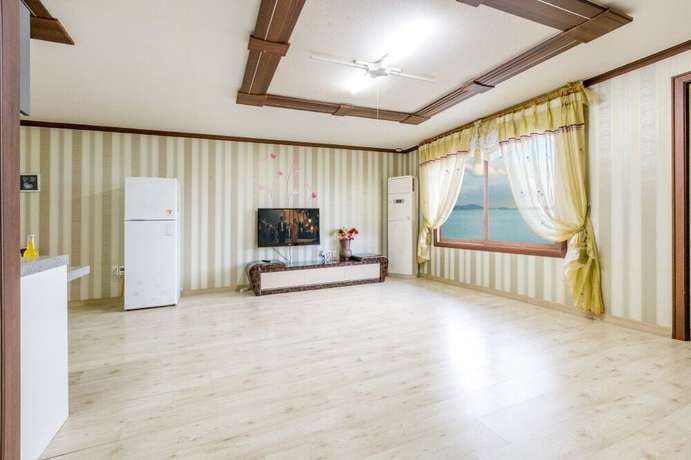 Imagen de la habitación del Hotel Sunrise Pension. Foto 5