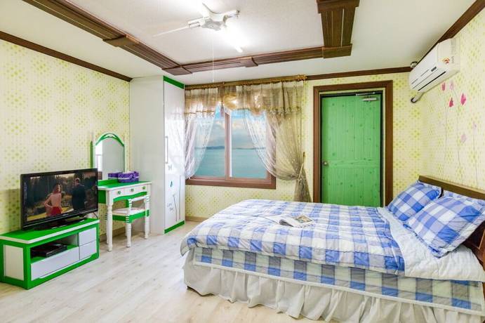 Imagen de la habitación del Hotel Sunrise Pension. Foto 6