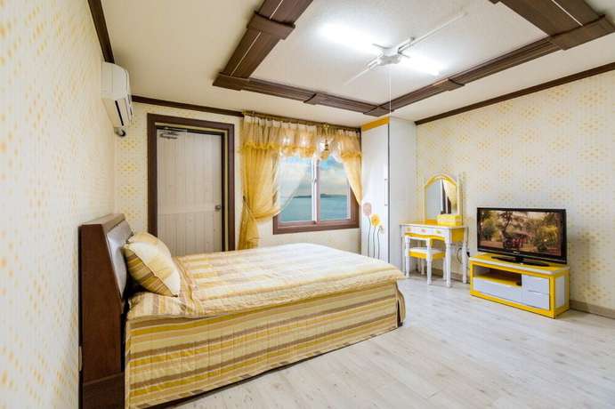 Imagen de la habitación del Hotel Sunrise Pension. Foto 7