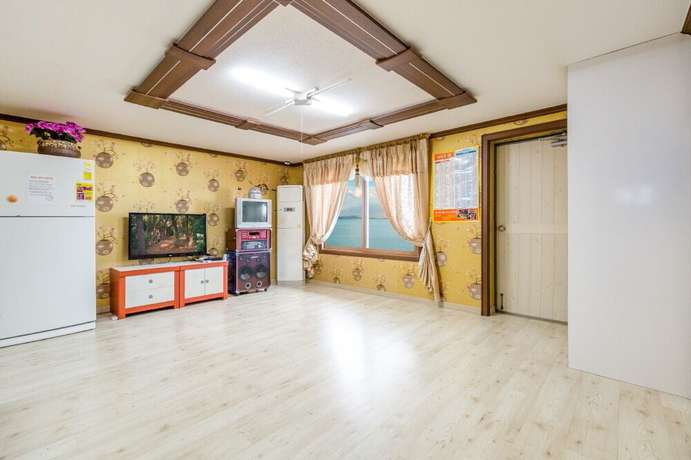 Imagen de la habitación del Hotel Sunrise Pension. Foto 8