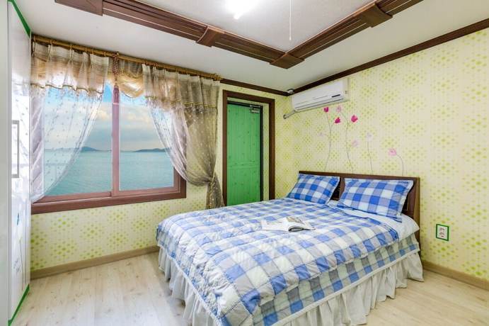 Imagen de la habitación del Hotel Sunrise Pension. Foto 9