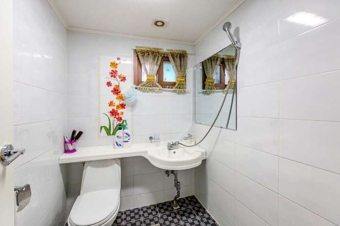 Imagen de la habitación del Hotel Sunrise Pension. Foto 11