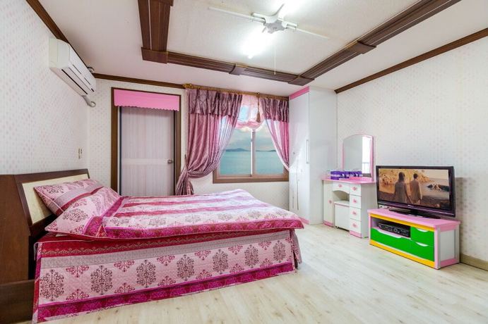 Imagen de la habitación del Hotel Sunrise Pension. Foto 13