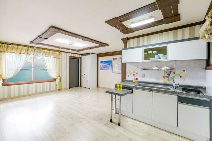 Imagen de la habitación del Hotel Sunrise Pension. Foto 18