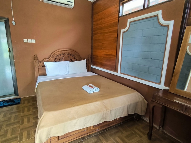 Imagen de la habitación del Hotel Sunrise Sea Hill Cottages. Foto 3