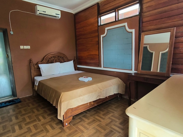 Imagen de la habitación del Hotel Sunrise Sea Hill Cottages. Foto 7