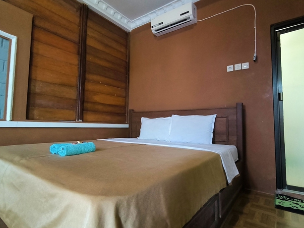 Imagen de la habitación del Hotel Sunrise Sea Hill Cottages. Foto 8