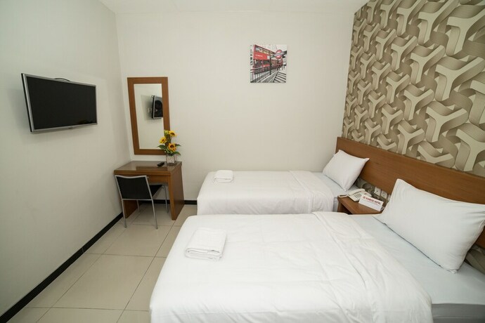 Imagen de la habitación del Hotel Sunrise Semarang. Foto 15
