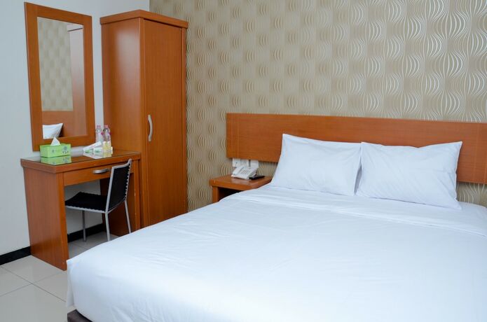 Imagen de la habitación del Hotel Sunrise Semarang. Foto 19