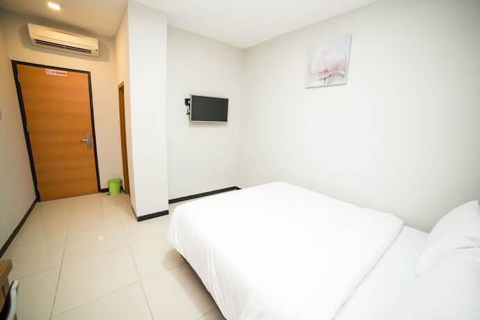 Imagen de la habitación del Hotel Sunrise Semarang. Foto 20