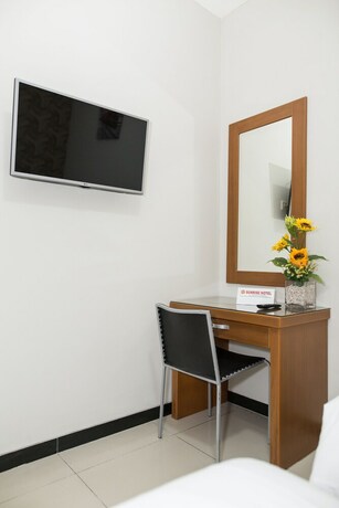 Imagen de la habitación del Hotel Sunrise Semarang. Foto 24