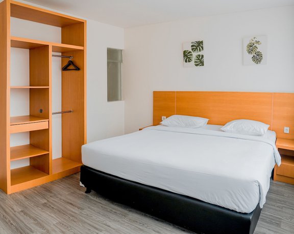 Imagen de la habitación del Hotel Sunrise Suite Seminyak. Foto 14
