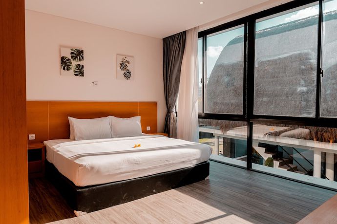 Imagen de la habitación del Hotel Sunrise Suite Seminyak. Foto 18