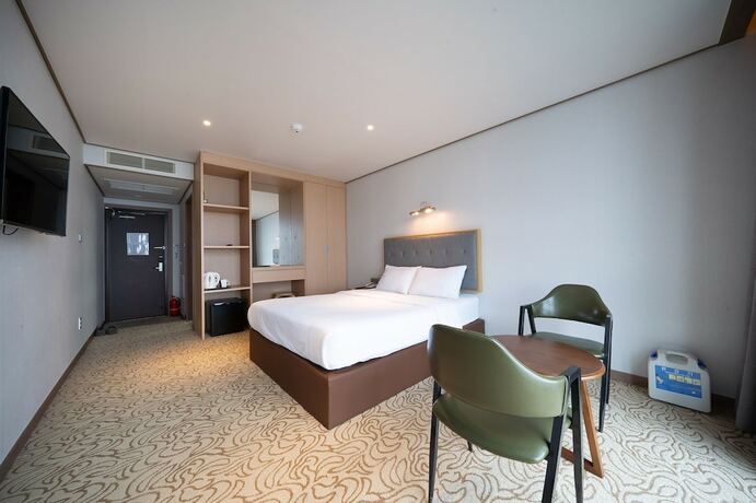Imagen de la habitación del Hotel Sunrise Sungsan. Foto 18