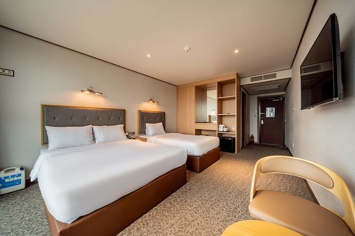 Imagen de la habitación del Hotel Sunrise Sungsan. Foto 21