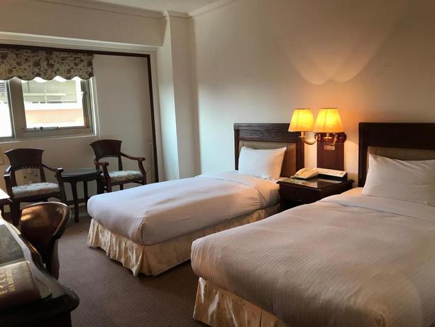 Imagen de la habitación del Hotel Sunrise Tainan. Foto 2
