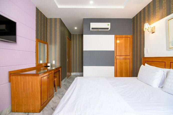 Imagen de la habitación del Hotel Sunrise Trung Son. Foto 16