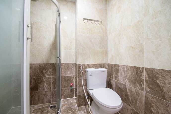 Imagen de la habitación del Hotel Sunrise Trung Son. Foto 17