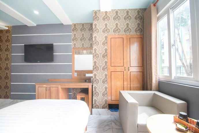 Imagen de la habitación del Hotel Sunrise Trung Son. Foto 18