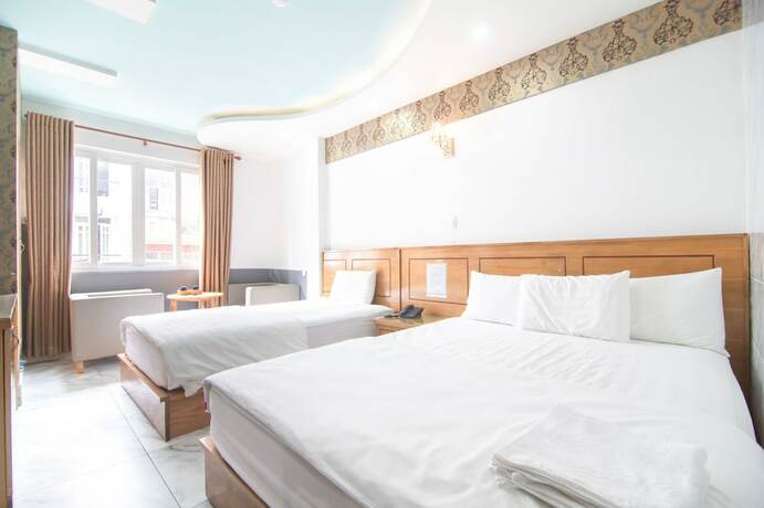 Imagen de la habitación del Hotel Sunrise Trung Son. Foto 19