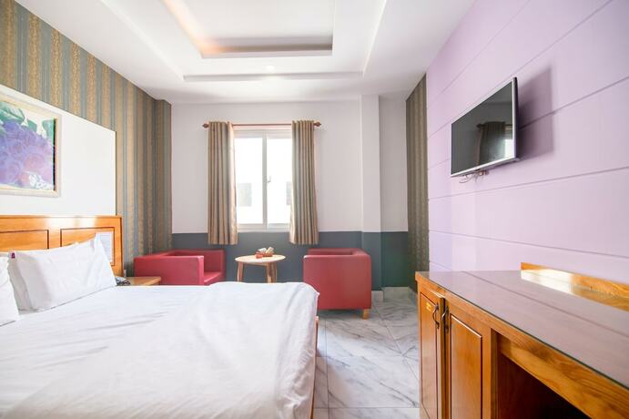 Imagen de la habitación del Hotel Sunrise Trung Son. Foto 24