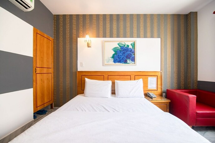 Imagen de la habitación del Hotel Sunrise Trung Son. Foto 25