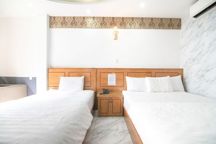 Imagen de la habitación del Hotel Sunrise Trung Son. Foto 26