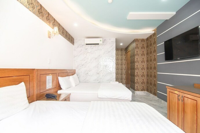Imagen de la habitación del Hotel Sunrise Trung Son. Foto 29