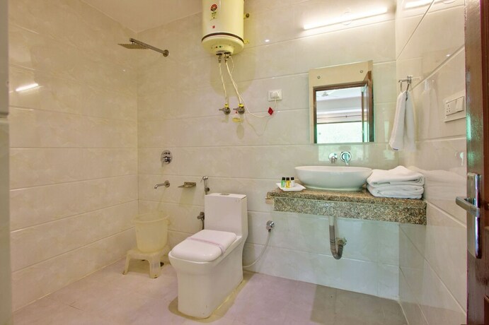 Imagen de la habitación del Hotel Sunrise Villa Manali. Foto 17