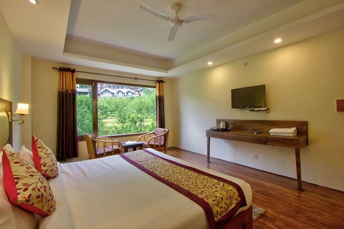 Imagen de la habitación del Hotel Sunrise Villa Manali. Foto 22