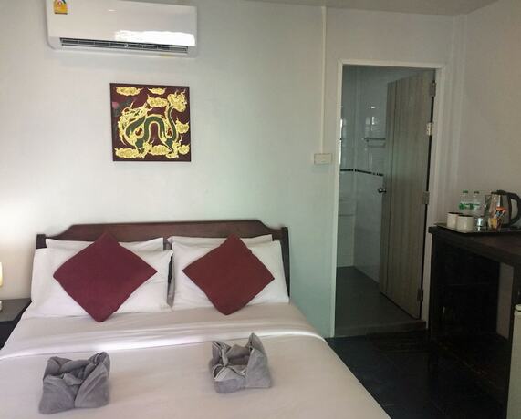 Imagen de la habitación del Hotel Sunrise Villas Seaview. Foto 18