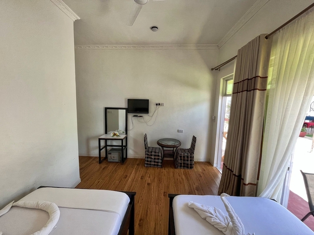Imagen de la habitación del Hotel Sunrise and Resort. Foto 7