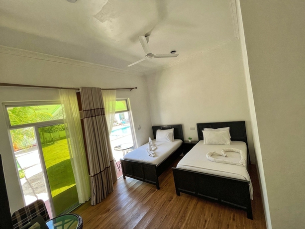 Imagen de la habitación del Hotel Sunrise and Resort. Foto 12