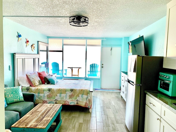 Imagen de la habitación del Hotel Sunrise on the Beach. Foto 2