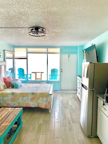 Imagen de la habitación del Hotel Sunrise on the Beach. Foto 8