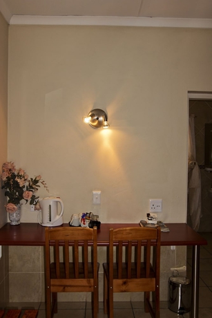 Imagen de la habitación del Hotel Sunrock Guesthouse. Foto 9