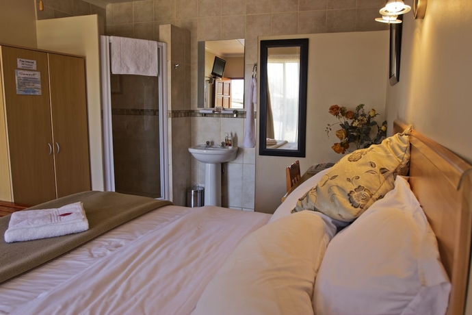 Imagen de la habitación del Hotel Sunrock Guesthouse. Foto 13