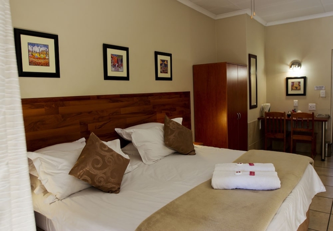 Imagen de la habitación del Hotel Sunrock Guesthouse. Foto 16