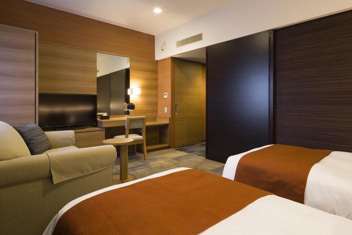 Imagen de la habitación del Hotel Sunroute Chiba. Foto 2
