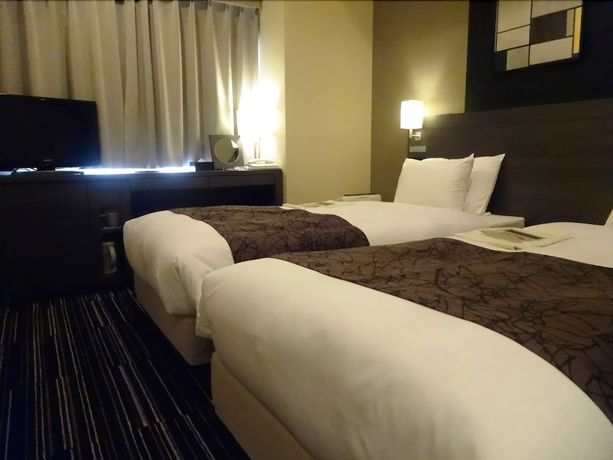 Imagen de la habitación del Hotel Sunroute Fukuchiyama. Foto 11