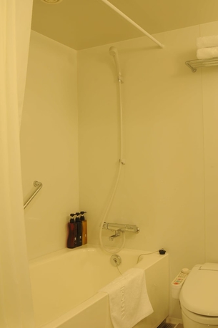 Imagen de la habitación del Hotel Sunroute Kumagaya Station. Foto 8
