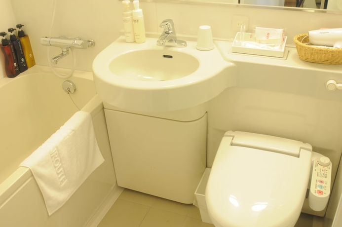 Imagen de la habitación del Hotel Sunroute Kumagaya Station. Foto 11