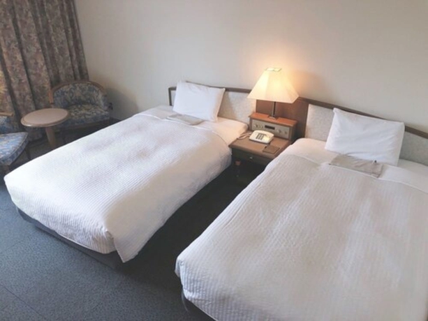 Imagen de la habitación del Hotel Sunroute Niigata. Foto 7
