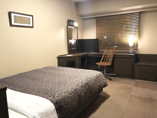 Imagen de la habitación del Hotel Sunroute Niigata. Foto 11