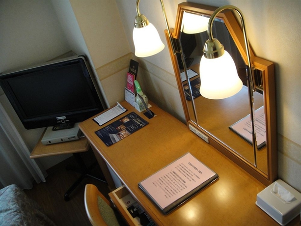 Imagen de la habitación del Hotel Sunroute Patio Omori. Foto 3