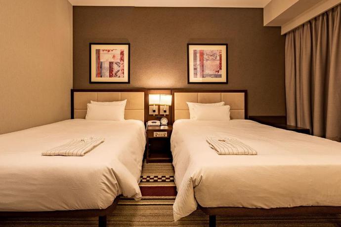 Imagen de la habitación del Hotel Sunroute Plaza Shinjuku. Foto 11