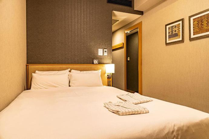 Imagen de la habitación del Hotel Sunroute Plaza Shinjuku. Foto 12