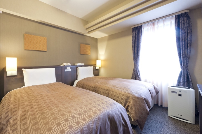 Imagen de la habitación del Hotel Sunroute Sapporo. Foto 3