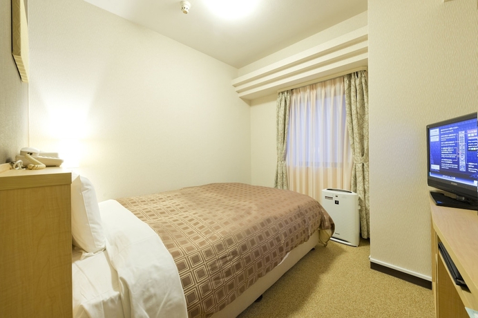 Imagen de la habitación del Hotel Sunroute Sapporo. Foto 13